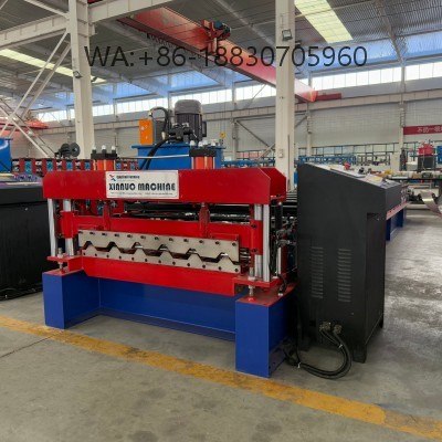 A máquina formadora de painéis trapezoidais para telhados 980 da Xinnuo produz 980 painéis trapezoidais para uma ampla gama de aplicações. O modelo 980 oferece vantagens como grande vão e ampla área de cobertura.