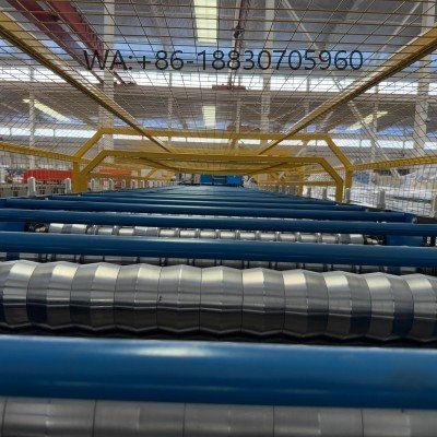 La máquina de láminas corrugadas para techos 990 de Xinnuo es un modelo habitual en nuestra fábrica. En América, la demanda de láminas para techos 990 está aumentando gradualmente.