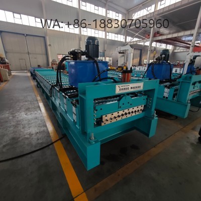 Mesin pembentuk Spandek 935 untuk produksi panel atap baja dengan akurasi tinggi, kecepatan stabil, dan dukungan penuh untuk profil custom.