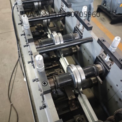 Door-frame-machine for precision metal door and window frame manufacturing, customizable profiles for construction applications, durable and high-efficiency production.