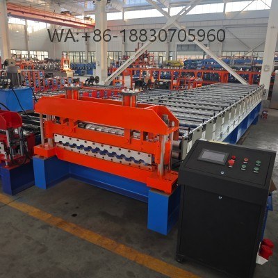 Pabrikan mesin cetak spandek tipe 935 otomatis berkecepatan tinggi. Solusi investasi terbaik untuk produksi atap galvalum gelombang bulat yang presisi dan bebas cacat.